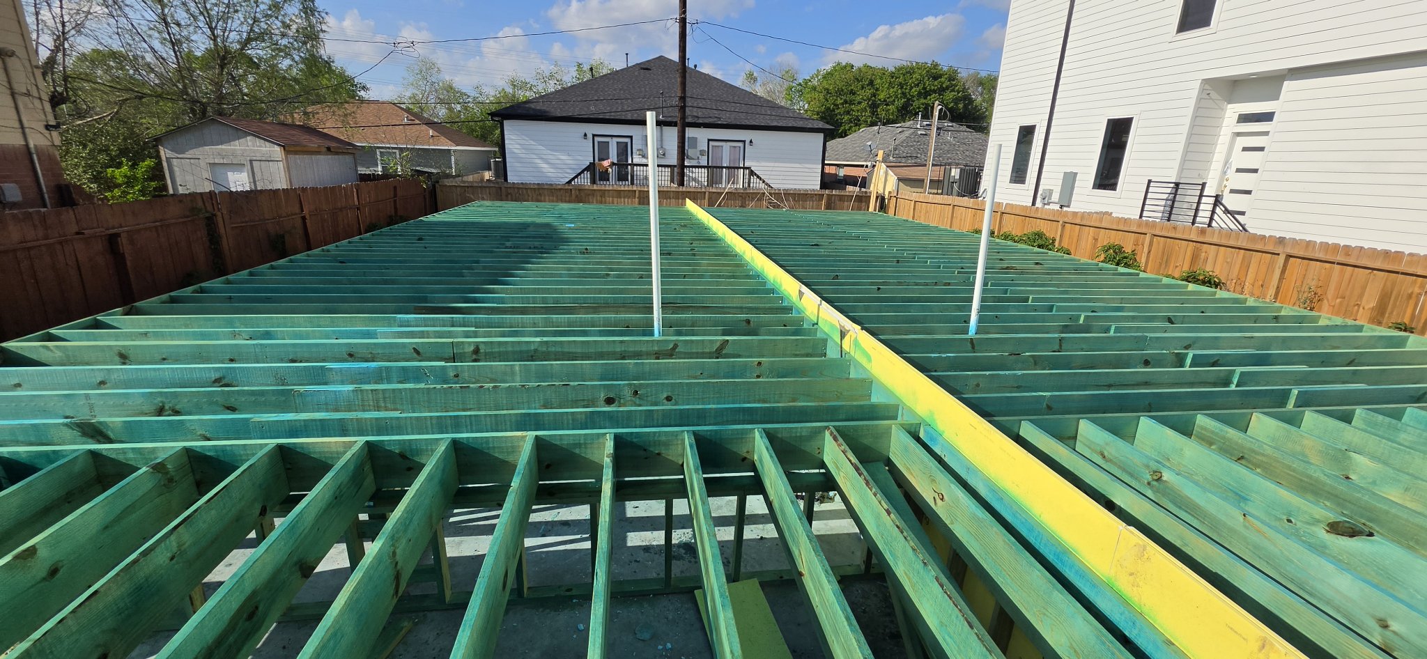 New construction foundation prepared with treatment lines before the next building stage